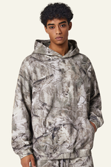 Camouflage sweatshirt with fleece lining and hood.