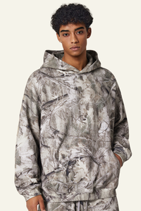 Camouflage sweatshirt with fleece lining and hood.